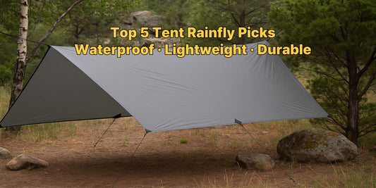 Grey waterproof tent rainfly set up in a forest with trees and rocks, designed for outdoor camping, backpacking, and all-weather shelter.