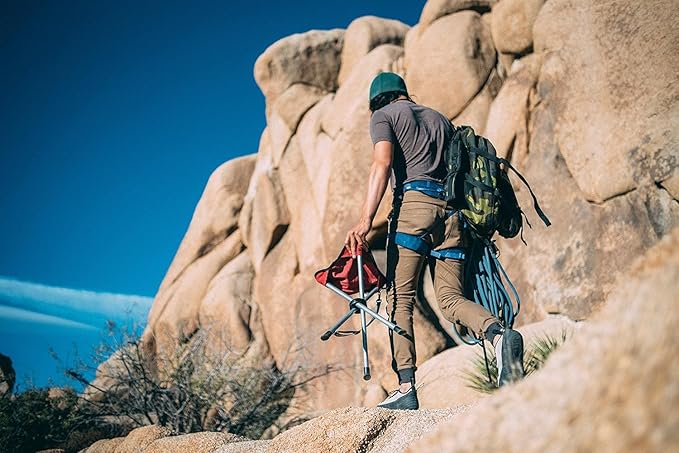 Travel Chair Slacker Tripod Chair for Camping, Lightweight Chair, Adjustable Carry Strap for Easy Transport | Oversized Duck Feet for Improved Stability | Perfect for Outdoor Adventures (Red)